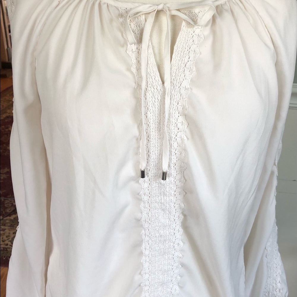 Loose creamy blouse